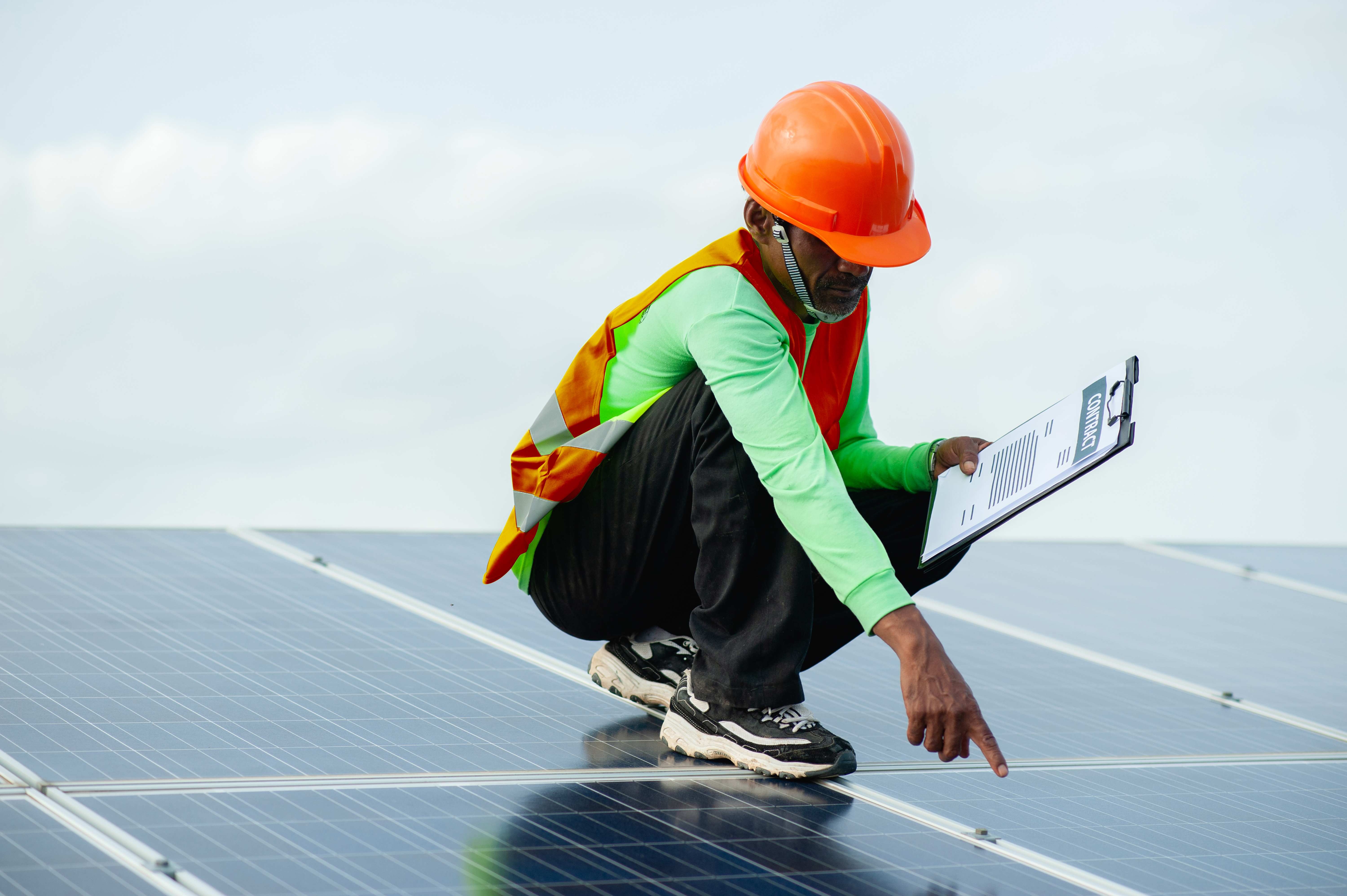 Solar panel technician at work